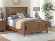 Rowlenstown Queen Poster Bed with Mirrored Dresser and Nightstand in Brown - PKG023757