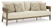 Serene Bay Outdoor Sofa and Loveseat with Coffee Table in Dark Brown/White from Ashley - DMV Furniture