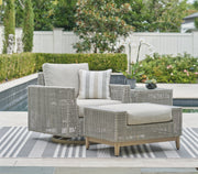 Seton Creek Outdoor Lounge Chair and Ottoman in Gray from Ashley - DMV Furniture