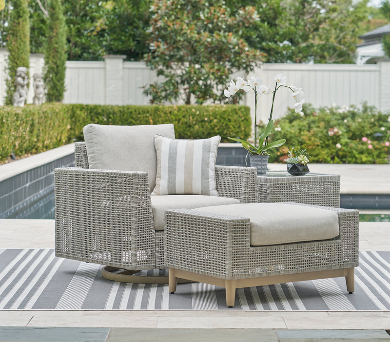 Seton Creek Outdoor Lounge Chair and Ottoman in Gray from Ashley - DMV Furniture