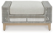 Seton Creek Outdoor Lounge Chair and Ottoman in Gray from Ashley - DMV Furniture
