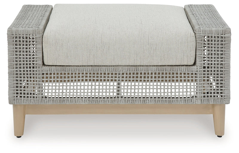Seton Creek Outdoor Lounge Chair and Ottoman in Gray from Ashley - DMV Furniture