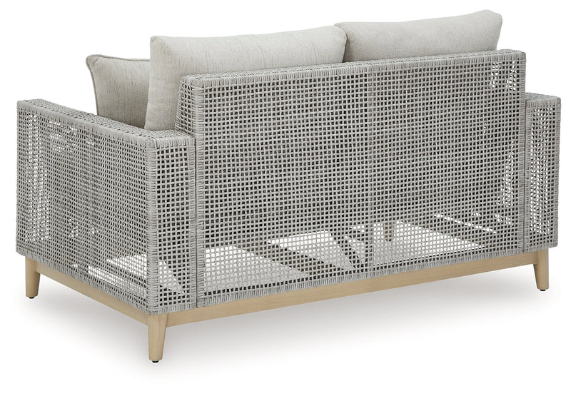 Seton Creek Outdoor Sofa and Loveseat with Coffee Table in Gray from Ashley - DMV Furniture