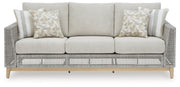 Seton Creek Outdoor Sofa and Loveseat with Coffee Table in Gray from Ashley - DMV Furniture