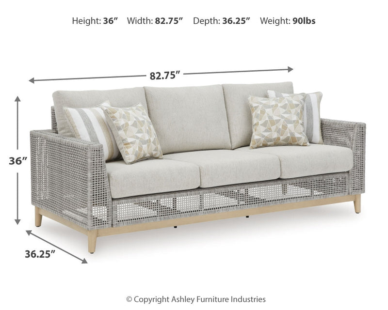 Seton Creek Outdoor Sofa and Loveseat with Coffee Table in Gray from Ashley - DMV Furniture