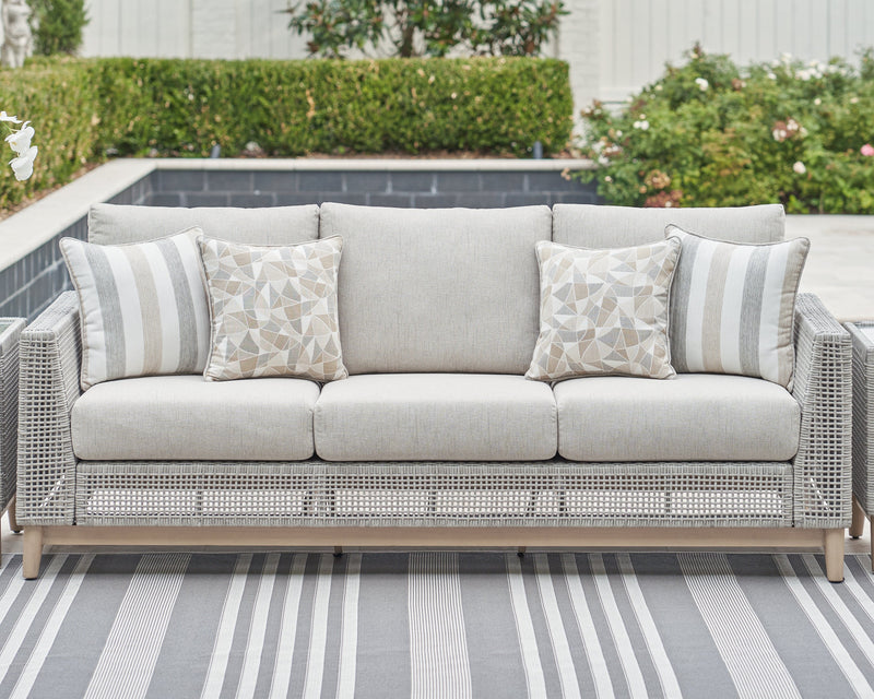Seton Creek Outdoor Sofa and Loveseat with Coffee Table in Gray from Ashley - DMV Furniture