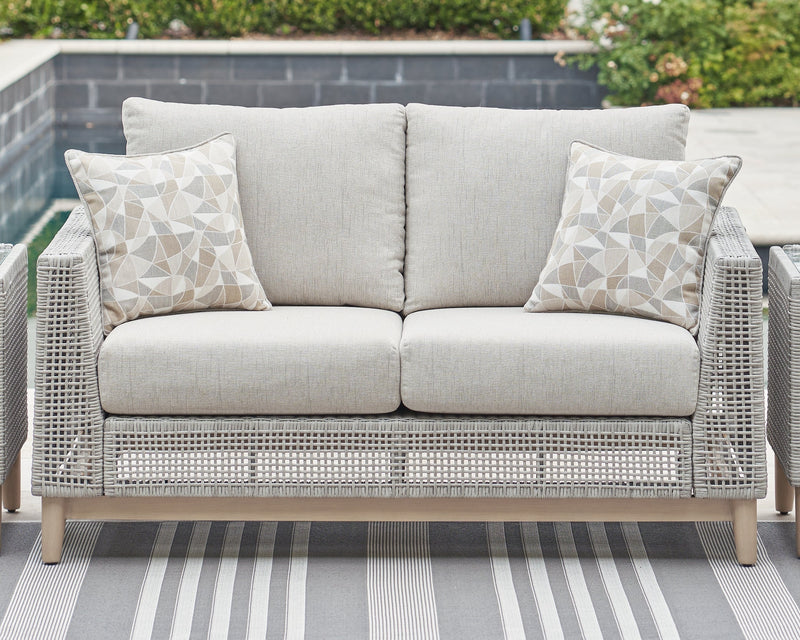 Seton Creek Outdoor Sofa and Loveseat with Coffee Table in Gray from Ashley - DMV Furniture