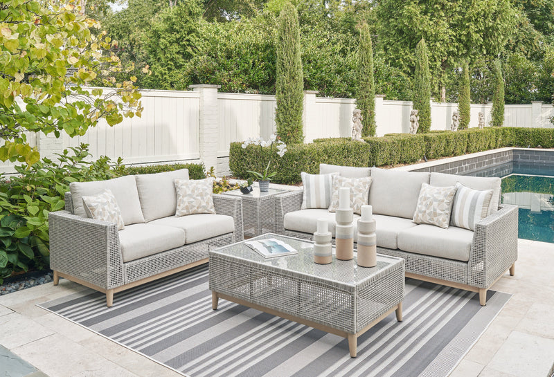 Seton Creek Outdoor Sofa and Loveseat with Coffee Table in Gray from Ashley - DMV Furniture