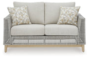 Seton Creek Outdoor Sofa and Loveseat with Coffee Table in Gray from Ashley - DMV Furniture