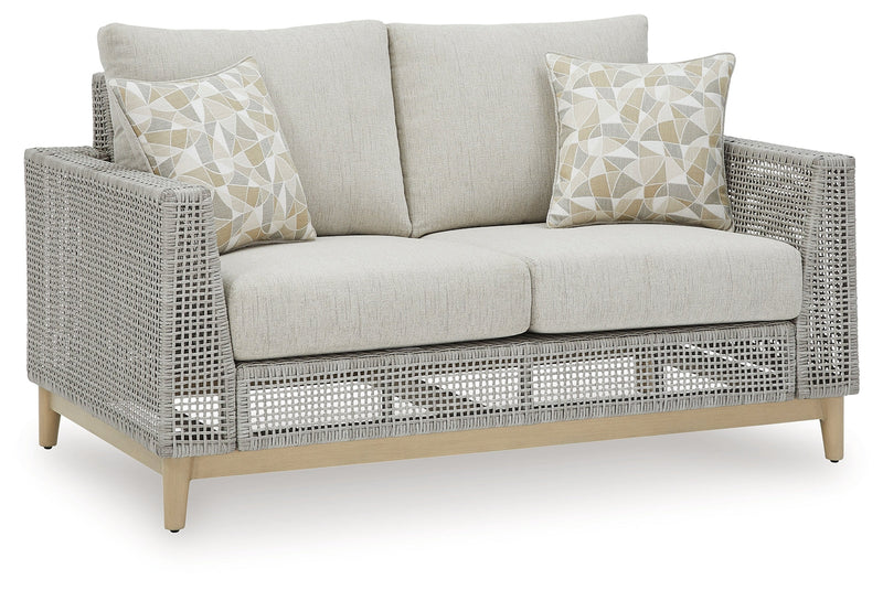 Seton Creek Outdoor Sofa and Loveseat with Coffee Table in Gray from Ashley - DMV Furniture