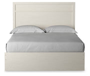 Stelsie Queen Panel Bed with Dresser and Nightstand in White from Ashley - DMV Furniture