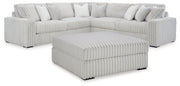 Stupendous Alloy 3-Piece Sectional with Ottoman from Ashley - DMV Furniture