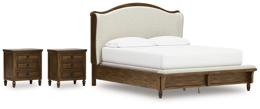 Sturlayne California King Upholstered Panel Bed with 2 Nightstands in Brown from Ashley - DMV Furniture