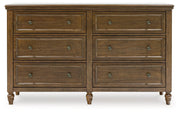 Sturlayne California King Upholstered Panel Bed with Dresser and 2 Nightstands in Brown from Ashley - DMV Furniture