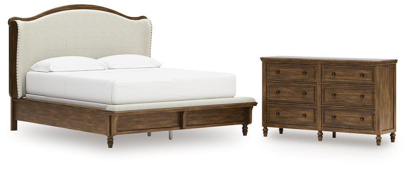 Sturlayne California King Upholstered Panel Bed with Dresser in Brown from Ashley - DMV Furniture