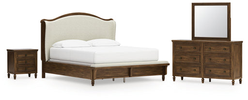 Sturlayne California King Upholstered Panel Bed with Mirrored Dresser and Nightstand in Brown from Ashley - DMV Furniture