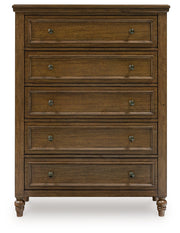 Sturlayne California King Upholstered Panel Bed with Mirrored Dresser, Chest and Nightstand in Brown from Ashley - DMV Furniture