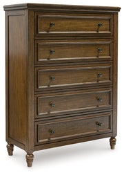 Sturlayne King Upholstered Panel Bed with Mirrored Dresser and Chest in Brown from Ashley - DMV Furniture