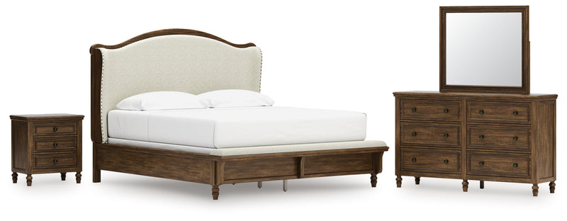 Sturlayne King Upholstered Panel Bed with Mirrored Dresser and Nightstand in Brown from Ashley - DMV Furniture