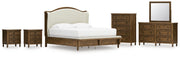 Sturlayne King Upholstered Panel Bed with Mirrored Dresser, Chest and 2 Nightstands in Brown from Ashley - DMV Furniture