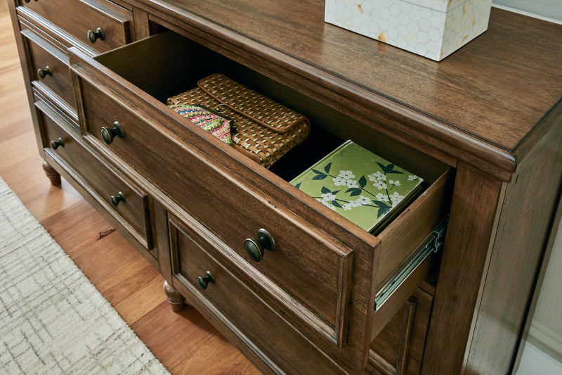 Sturlayne Queen Upholstered Panel Bed with Dresser and 2 Nightstands in Brown from Ashley - DMV Furniture
