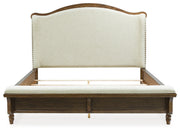 Sturlayne Queen Upholstered Panel Bed with Dresser and 2 Nightstands in Brown from Ashley - DMV Furniture
