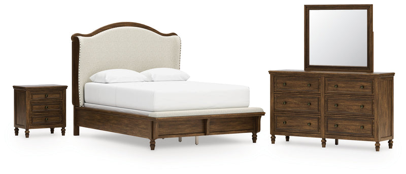 Sturlayne Queen Upholstered Panel Bed with Mirrored Dresser and Nightstand in Brown from Ashley - DMV Furniture