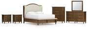 Sturlayne Queen Upholstered Panel Bed with Mirrored Dresser, Chest and 2 Nightstands in Brown from Ashley - DMV Furniture