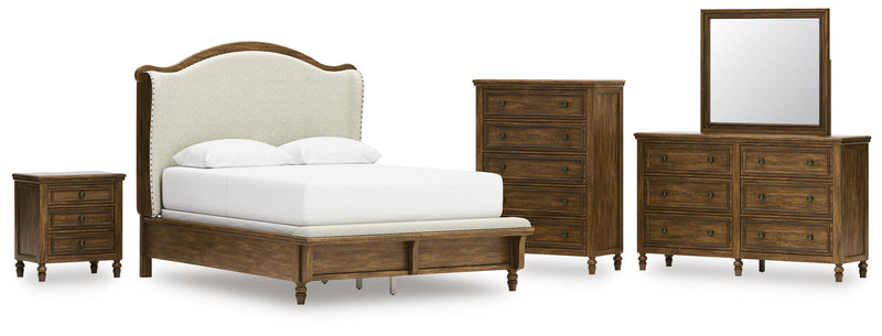 Sturlayne Queen Upholstered Panel Bed with Mirrored Dresser, Chest and Nightstand in Brown from Ashley - DMV Furniture