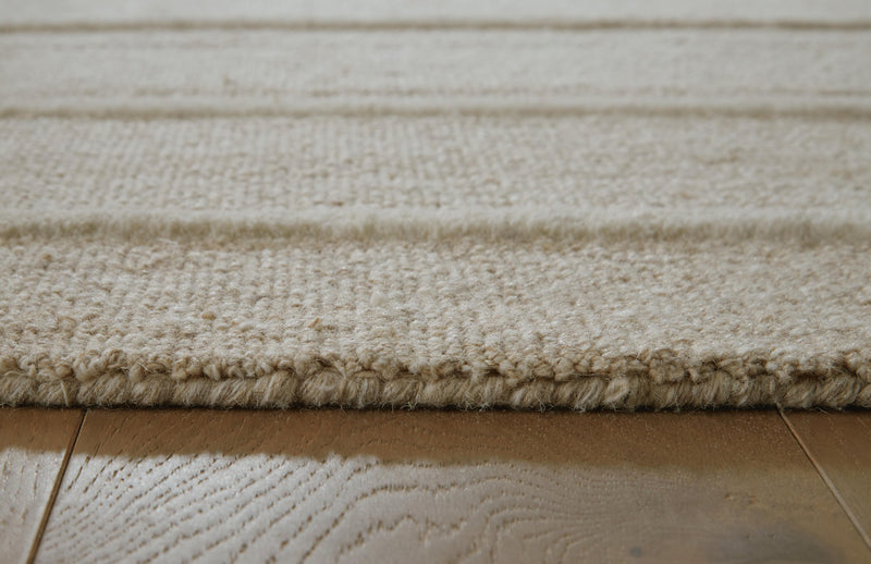Teelgan Ivory/Tan Extra Large Rug - R407310