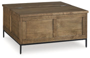 Torlanta Coffee Table with 2 End Tables in Brown - PKG019342