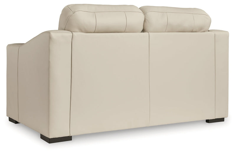 Tresure Trove Almond Loveseat - DMV FurnitureLoveseat