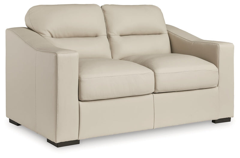 Tresure Trove Almond Loveseat - DMV FurnitureLoveseat