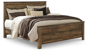 Trinell Brown King Panel Bed. Dresser, Mirror, Chest and 2 Nightstands - B446B97