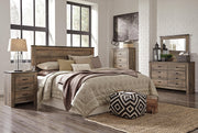 Trinell King/California King Panel Headboard Bed with Mirrored Dresser and 2 Nightstands in Brown - PKG005080