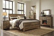Trinell King Panel Bed with Dresser, Chest and Nightstand in Brown from Ashley - DMV Furniture