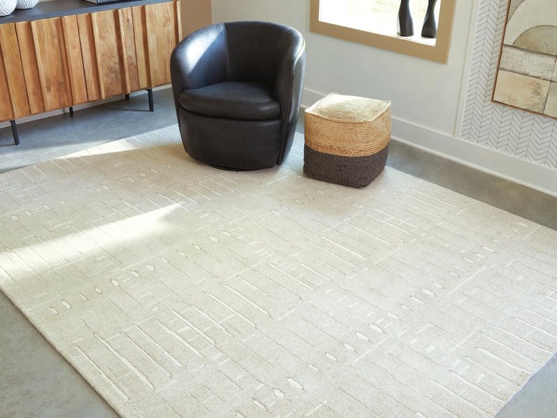 Wolbert Tan/Ivory 7'8" x 10' Area Rug - R407661