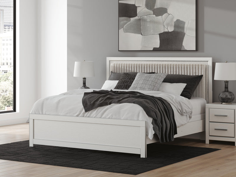 Zuraleus King Upholstered Panel Bed, Dresser and Nightstand in White - PKG022838