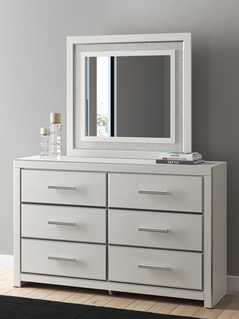 Zuraleus King Upholstered Panel Bed, Dresser, Mirror and Chest in White - PKG022835
