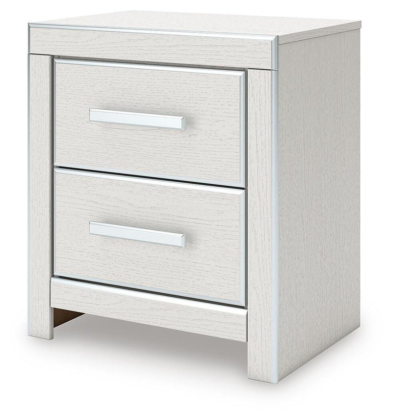 Zuraleus King Upholstered Panel Bed, Dresser, Mirror, Chest and Nightstand in White - PKG022836