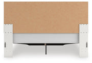 Zuraleus King Upholstered Panel Platform Storage Bed and Dresser in White - PKG022829