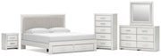 Zuraleus King Upholstered Panel Platform Storage Bed, Dresser, Mirror, Chest and Nightstand in White - PKG022828