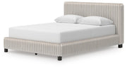 Zuraleus Queen Upholstered Bed, Chest and  Nightstand in White - PKG022841