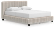 Zuraleus Queen Upholstered Bed, Dresser, Mirror and Chest in White - PKG022843