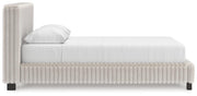 Zuraleus Queen Upholstered Bed, Dresser, Mirror and Chest in White - PKG022843