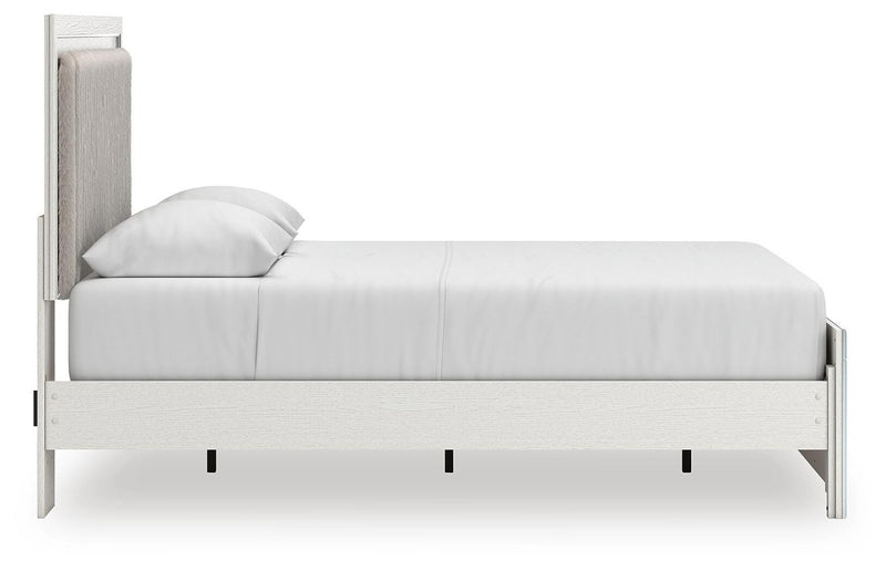 Zuraleus Queen Upholstered Panel Platform Bed, Dresser and Chest in White - PKG022792